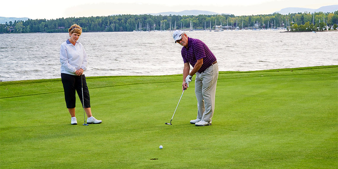 Bluff couple golfing